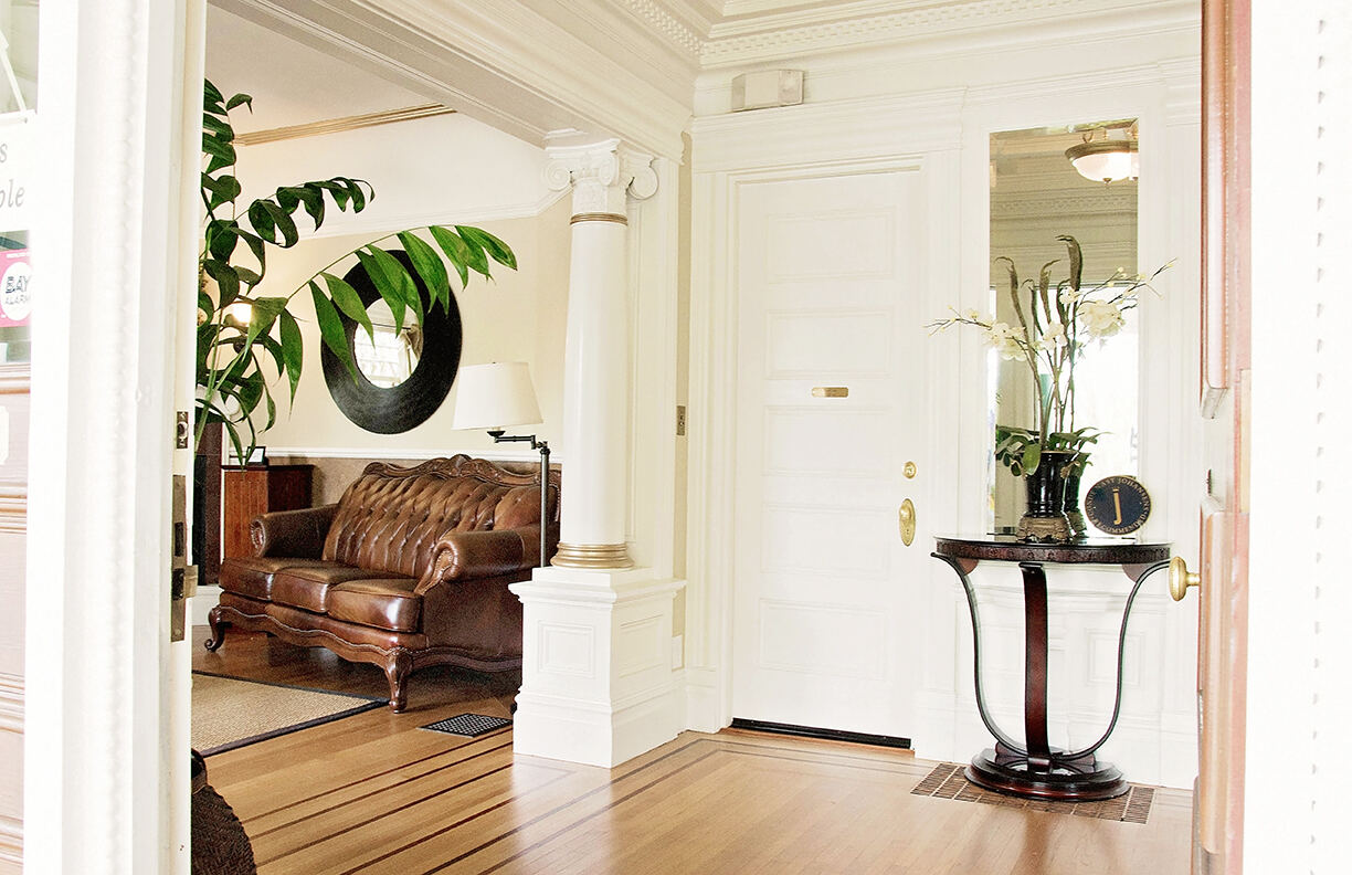 A light-filled suite interior at 1801 First Luxury Inn